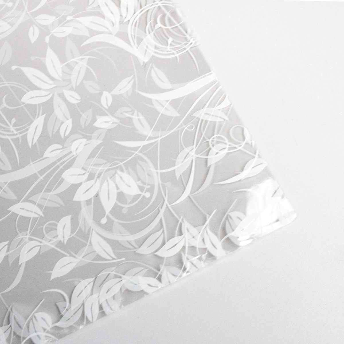 Papel celofan con diseño de patrón vegetal blanco