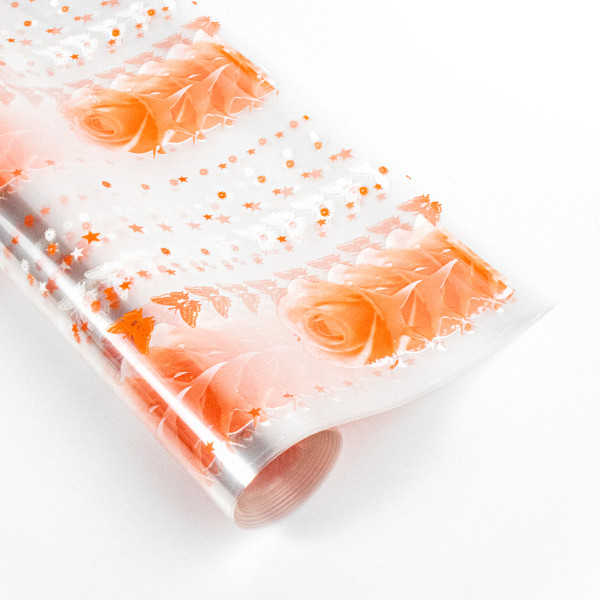 Papel celofan con diseño de patrón de rosas pequeñas naranjas